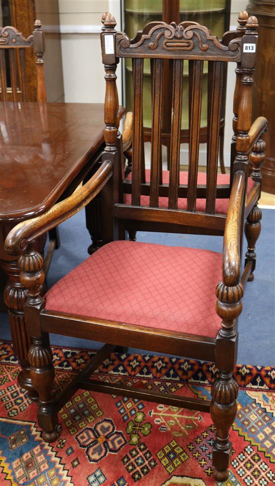 A set of 6, 17th century style oak dining chairs, (2 arm and 4 single)